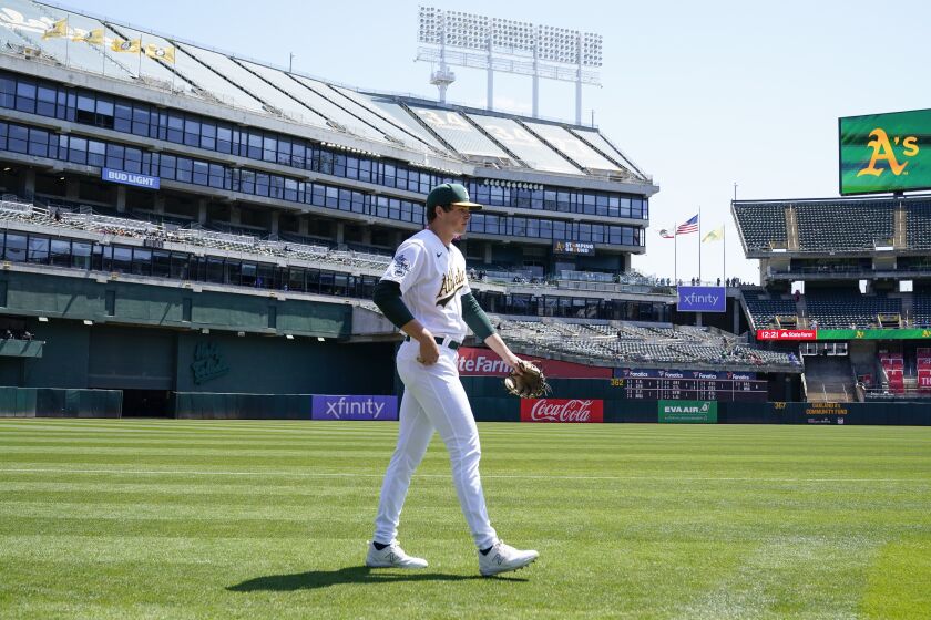 Oakland Athletics pitcher Mason Miller was to the dugout before the start of a baseball game against the Chicago Cubs in Oakland, Calif., Wednesday, April 19, 2023. (AP Photo/Godofredo A. Vásquez)