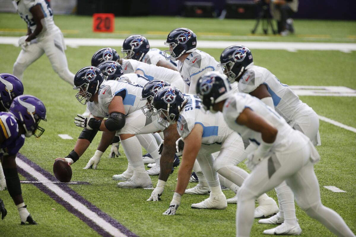 The Tennessee Titans line up against the Minnesota Vikings on Sunday in Minneapolis. 