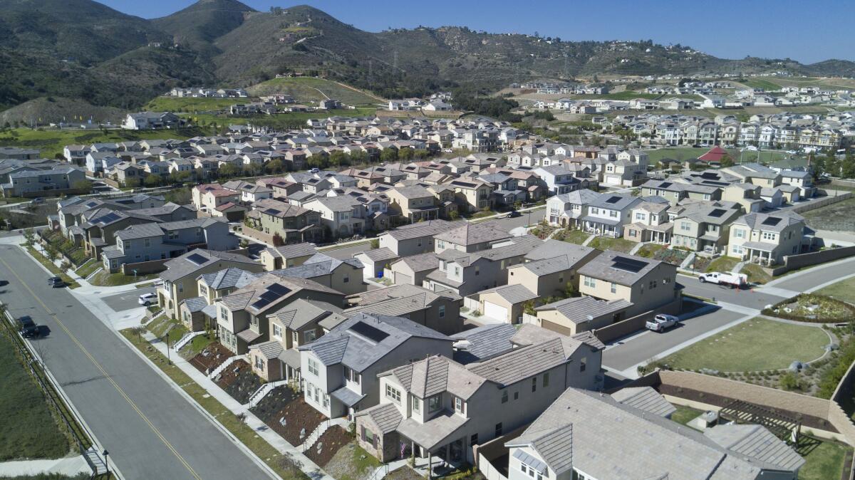 Photos of the new Harmony Grove Village west of Escondido. Two other large housing developments that would be built to the north and south of this project are now on hold after a judge's ruling.
