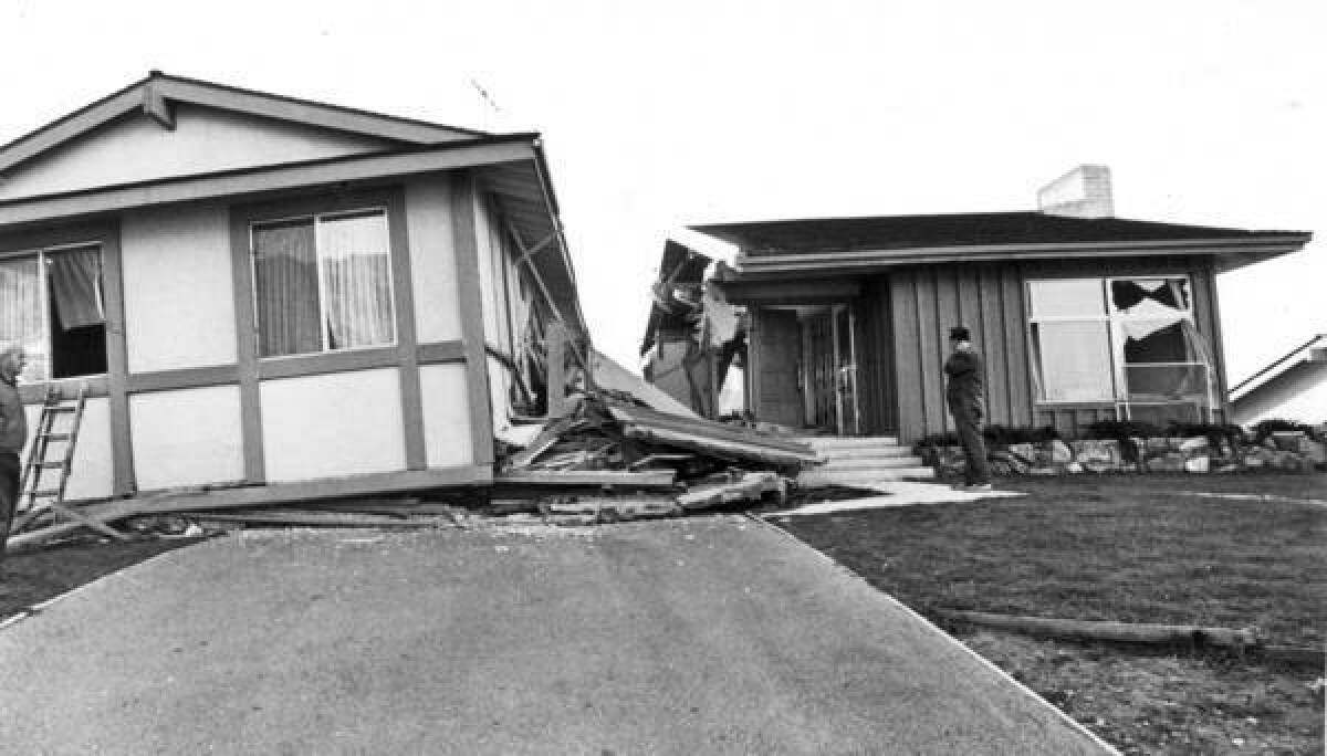 Shown is a home destroyed in the 1971 Sylmar earthquake, in which one side of the San Fernando fault moved as much as 8 feet. About 80% of the buildings along the fault suffered moderate to severe damage, illustrating the risks of building atop faults.