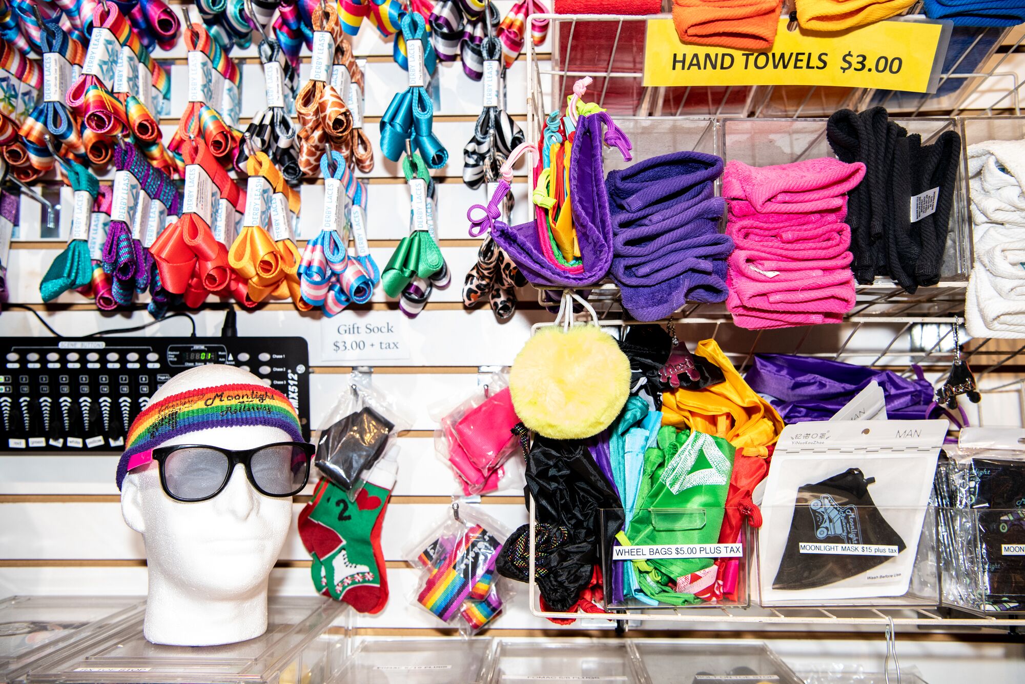 Shoelaces, towels and other items are on display and for sale at Moonlight Rollerway during Rainbow Skate Night.