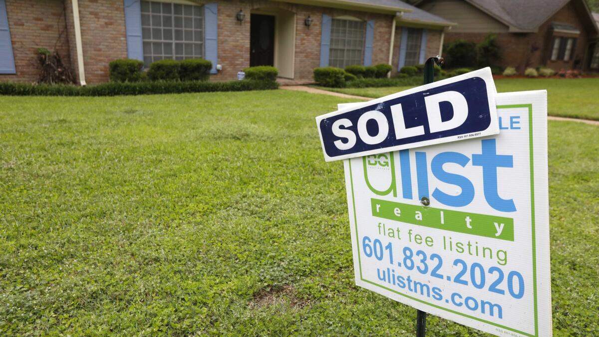 A sold sign in front of a home last month in Jackson, Miss.