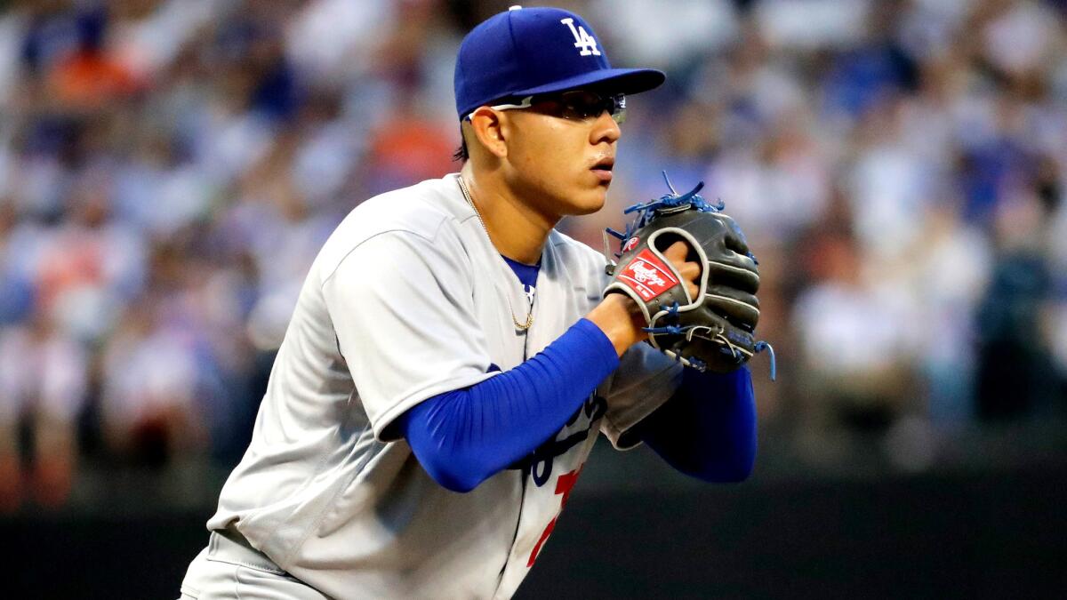 Julio Urias works from the stretch during a start against the Mets on May 27.