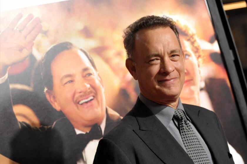 Tom Hanks arrives for the AFI premiere of his new movie, "Saving Mr. Banks," Thursday night in Hollywood.