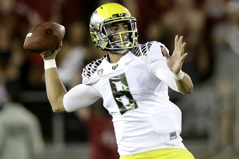 Oregon quarterback Marcus Mariota, shown against Stanford, had his threw his first pass intercepted of the season on Saturday.