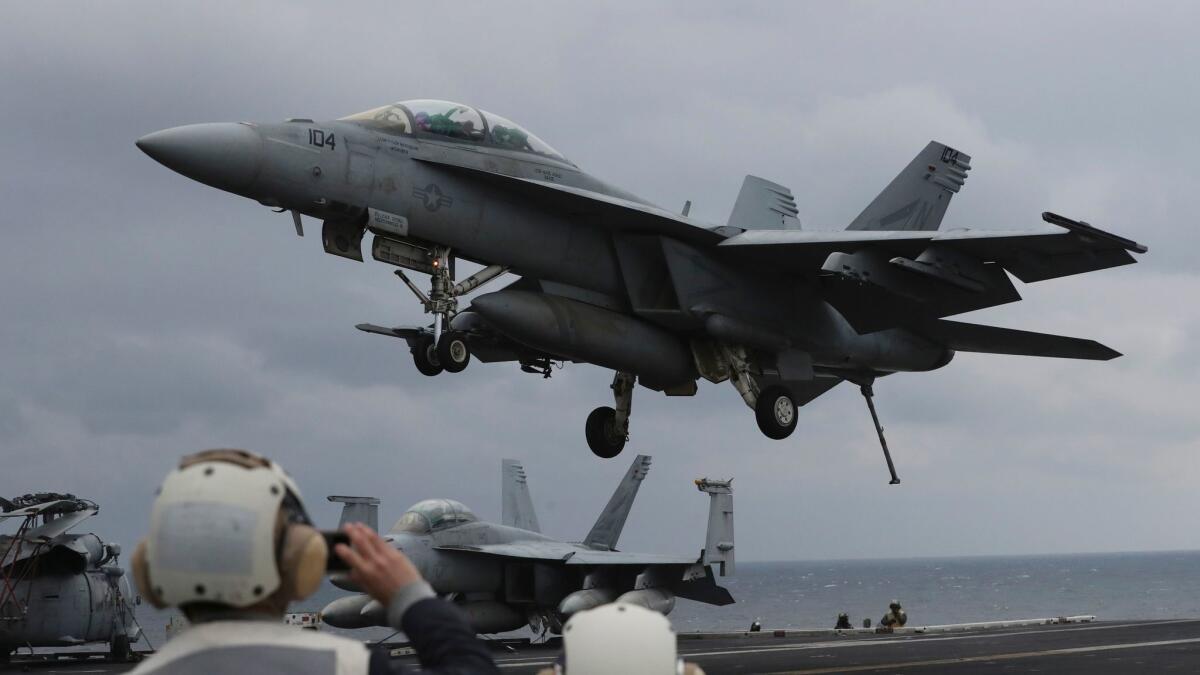 A Navy F/A-18 Super Hornet fighter approaches the deck of the U.S. aircraft carrier Carl Vinson during the annual joint military exercise called Foal Eagle between South Korea and the United States in March.