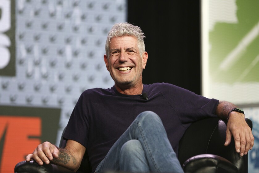 FILE - In this Sunday, March 13, 2016, file photo Anthony Bourdain speaks during South By Southwest at the Austin Convention Center, in Austin, Texas. The revelation that a documentary filmmaker used voice-cloning software to make the late chef Bourdain say words he never spoke has drawn criticism amid ethical concerns about use of the powerful technology. The movie “Roadrunner: A Film About Anthony Bourdain” appeared in cinemas Friday, July 16, 2021, and mostly features real footage of the beloved celebrity chef and globe-trotting television host before he died in 2018. (Photo by Rich Fury/Invision/AP, File)