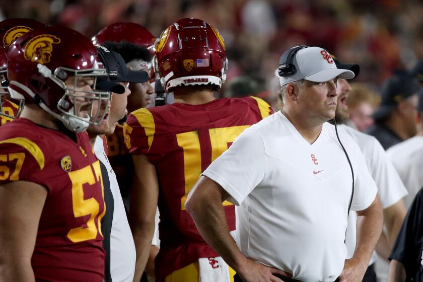 LOS ANGELES, CALIF. - SEP 11, 2021. USC head coach Clay Helton watches from the sideline.