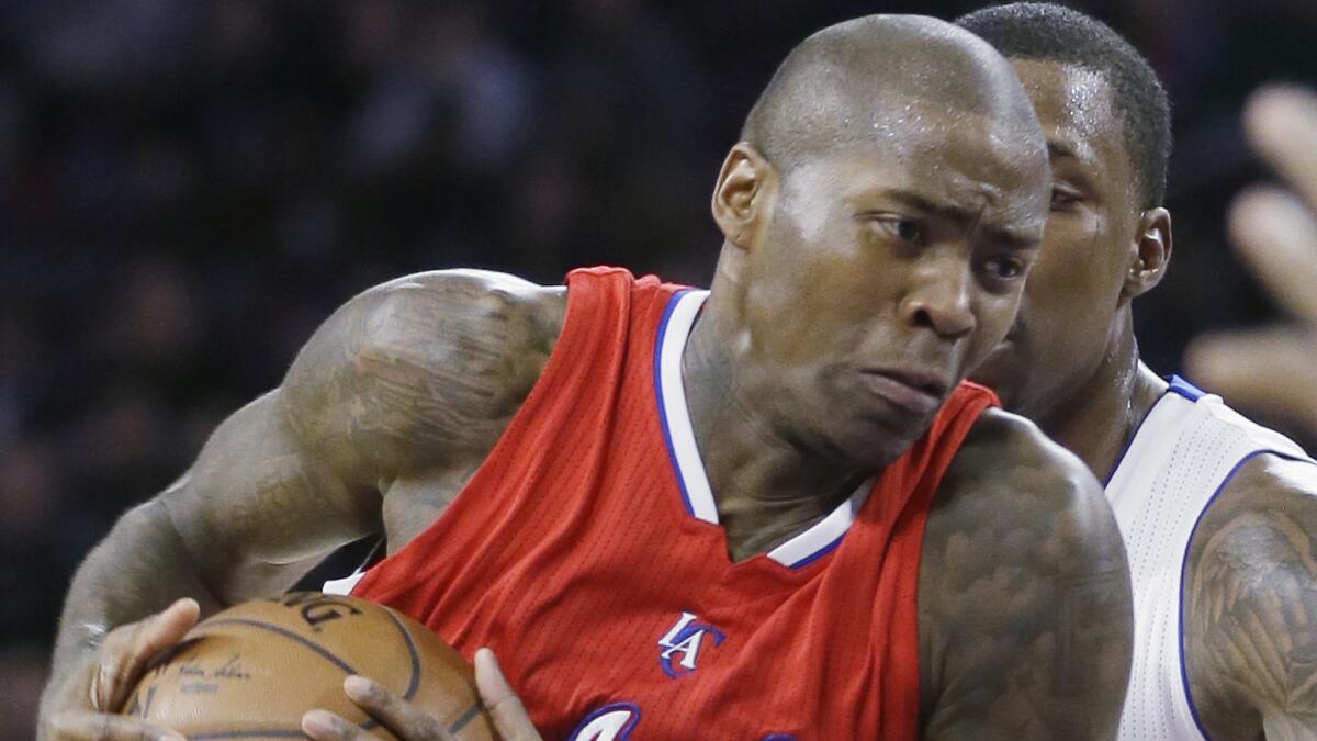 Clippers guard Jamal Crawford drives to the basket during the second half of a 104-98 victory over the Detroit Pistons on Wednesday.