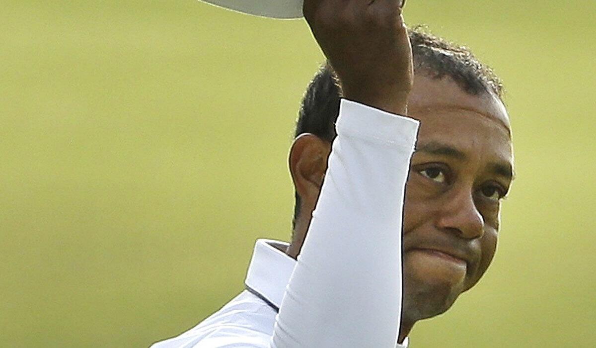 Tiger Woods, shown at the British Open in July, hasn't competed in golf since August.