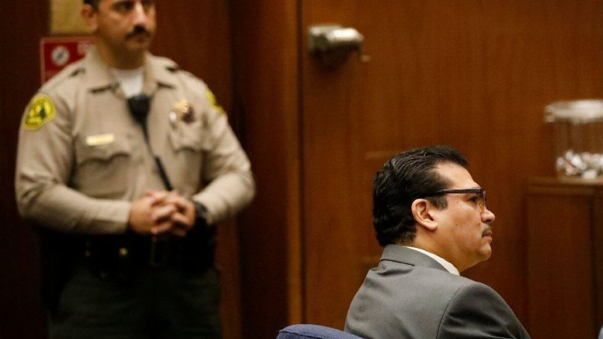 Paul Gonzales, a 1984 Olympic boxing champion and county-employed boxing coach, appears in Los Angeles Superior Court for a preliminary hearing Friday. He faces eight felony counts, including lewd acts on a child.