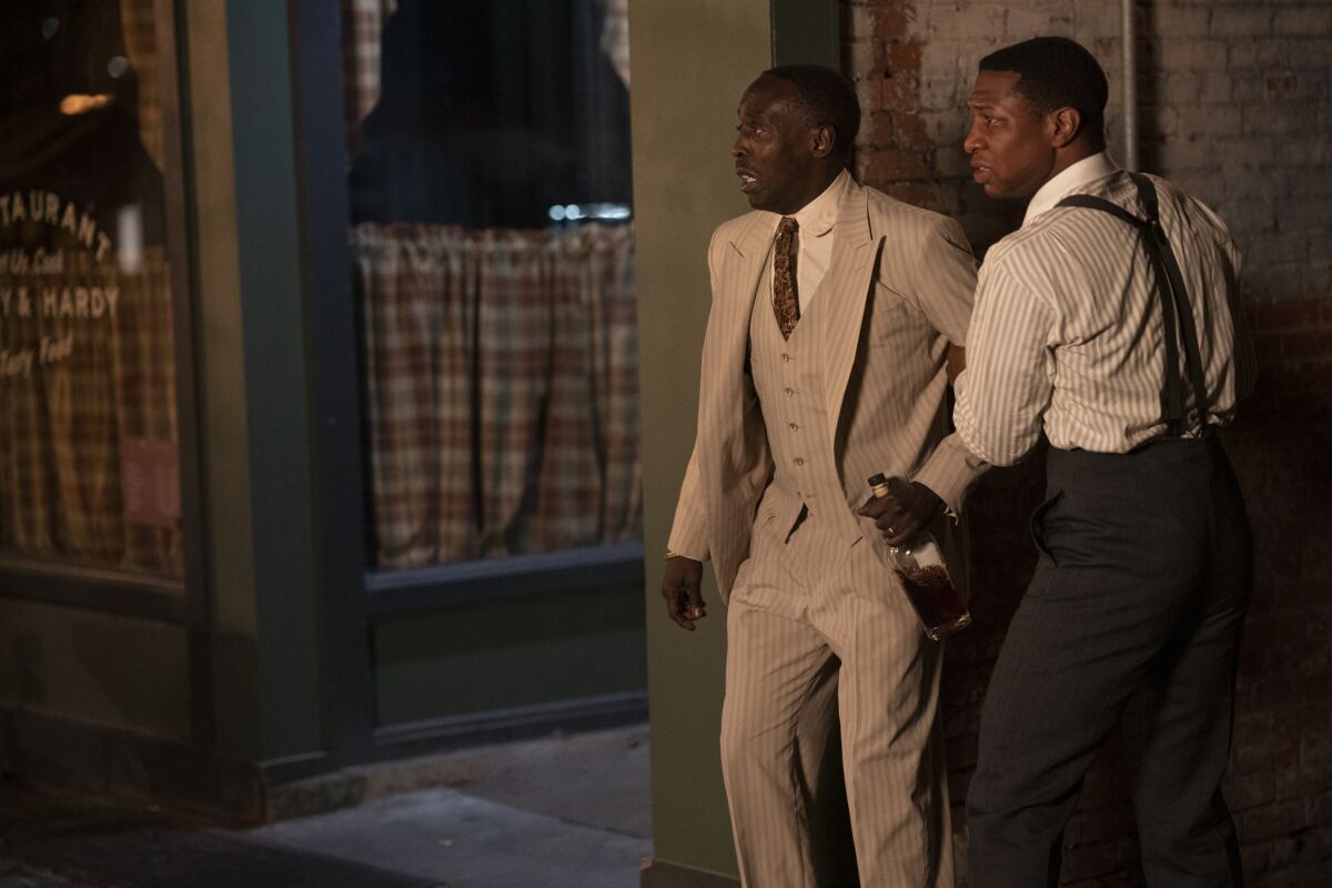 Michael K. Williams, left and Jonathan Majors in Episode 9 of "Lovecraft Country," set during the Tulsa race massacre.