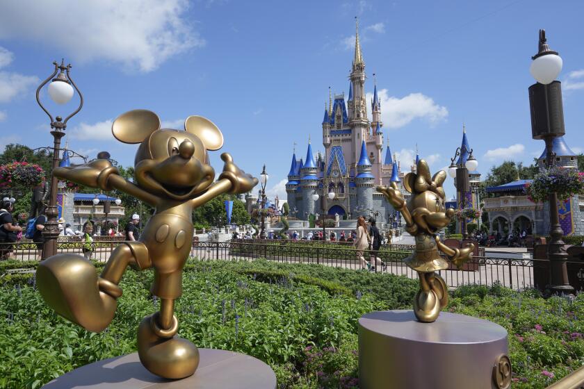 The Cinderella Castle is seen at the Magic Kingdom at Walt Disney World Friday, July 14, 2023, in Lake Buena Vista, Fla. Disney is asking a Florida judge to toss out a lawsuit filed by Gov. Ron DeSantis' appointees to Disney World's governing district.(AP Photo/John Raoux)