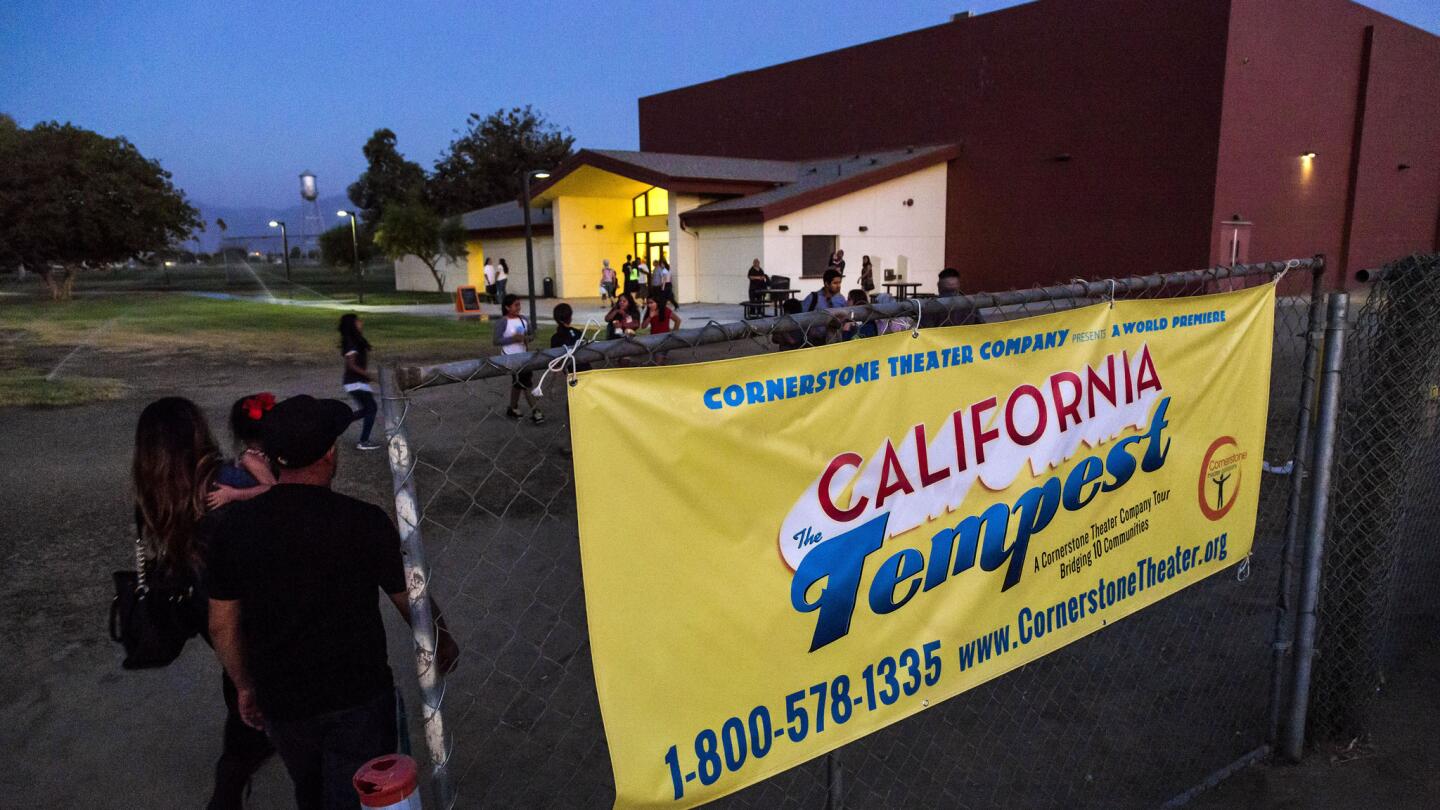 A Cornerstone Theater Company banner at the Sunset School announces the night's performance of "California: The Tempest" in the Sunset School gymnasium on Sept. 04, 2014. The Los Angeles company's mission is to do new contemporary professional theater that reflects the lives of various communities it works with and includes nonprofessional community members in its casts.