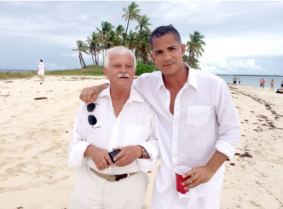 David Bunevacz, right, and his father in the Bahamas in 2015.