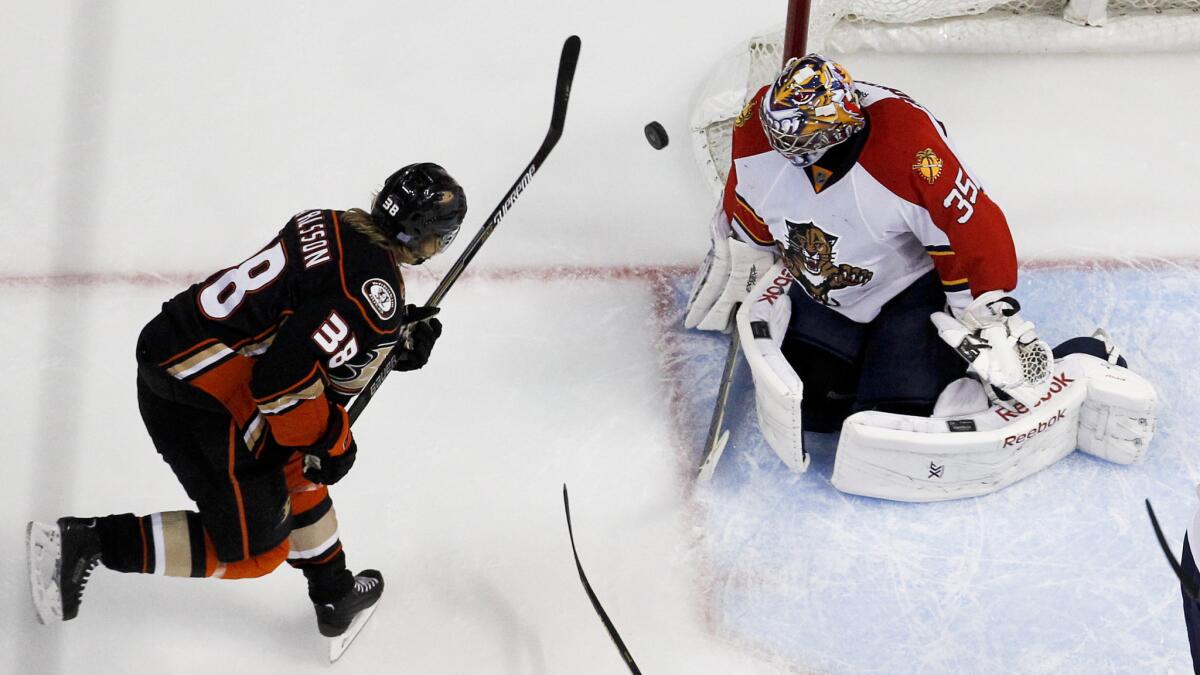 Florida Panthers goalie Al Montoya, right, blocks a shot by Ducks center William Karlsson during the first period of the Ducks' 6-2 loss Sunday.