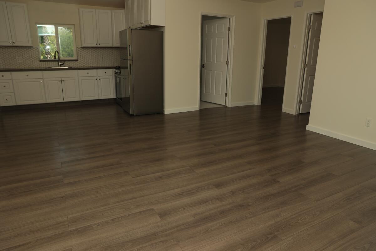 A home for rent with laminate gray flooring in Glassell Park. 