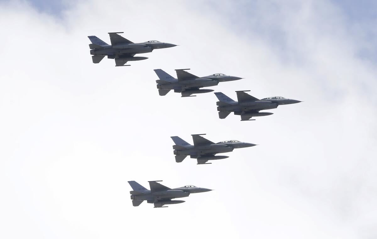 Flying formation of five of Taiwan's F-16 fighter jets