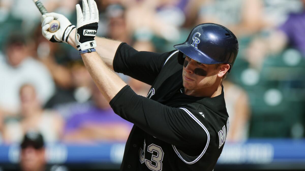 The Colorado Rockies have placed Justin Morneau on the disabled list because of a strained neck.
