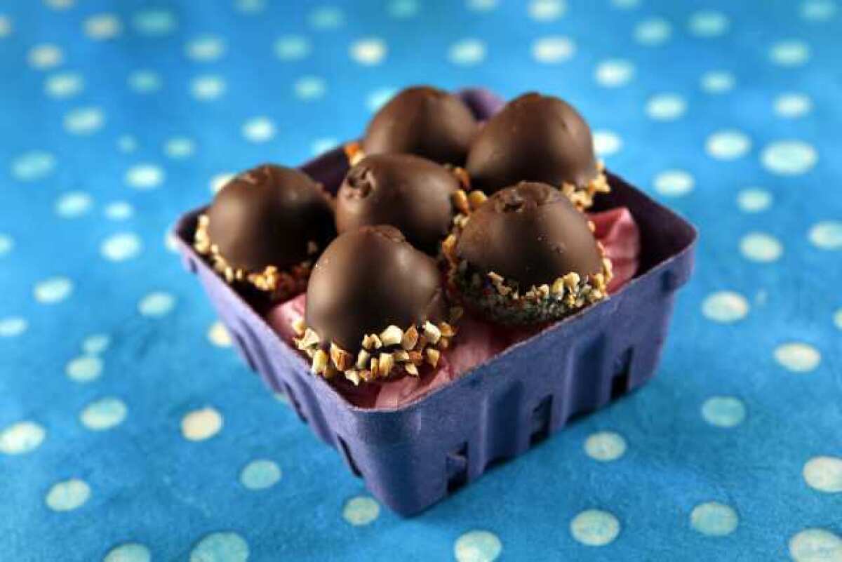 Chocolate-dipped almond eggs.