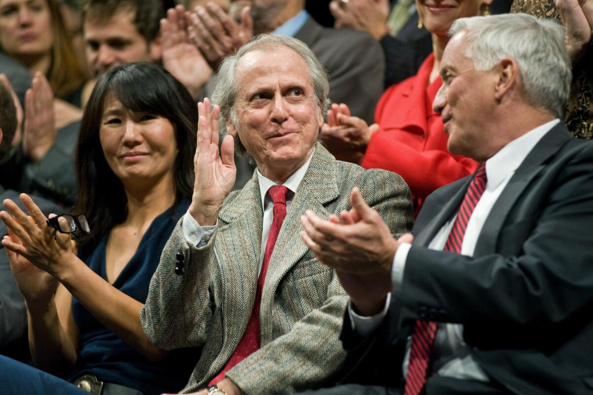 Don DeLillo, center, with writers Nami Mun, and Walter Isaacson at the 2012 Carl Sandburg Literary Awards dinner.