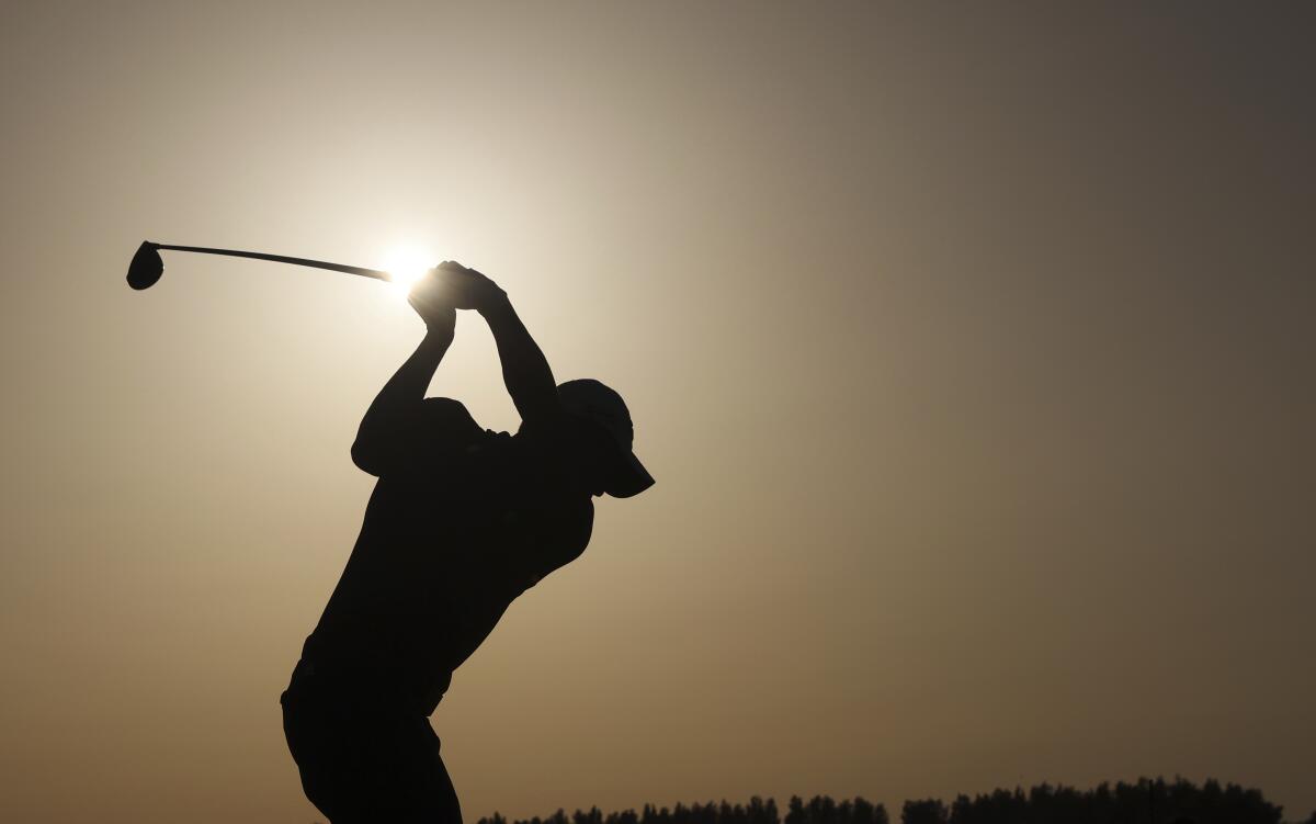 Collin Morikawa tees off the 18th hole during the third round of the British Open.