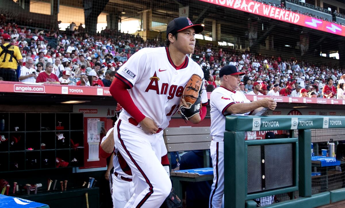 Shohei Ohtani takes the field for the Angels during a game against the Pittsburgh Pirates on July 21.
