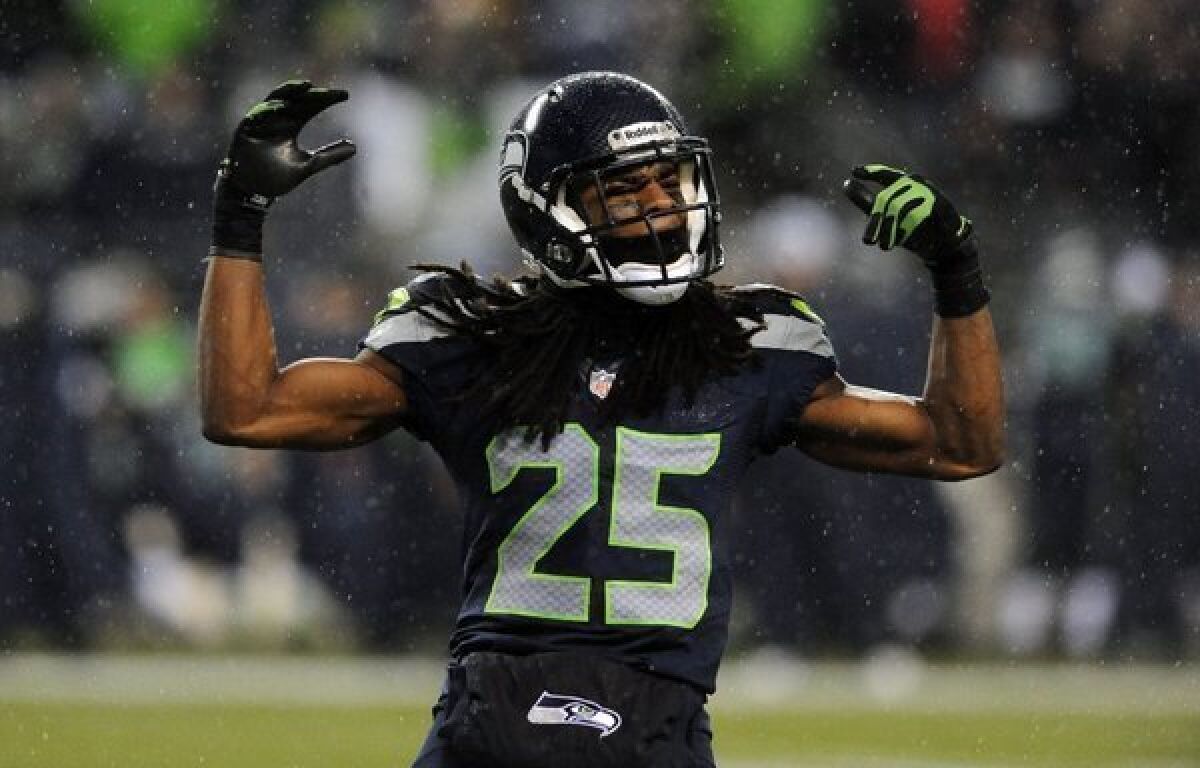 Seattle Seahawks cornerback Richard Sherman works the crowd in Sunday's game against San Francisco.