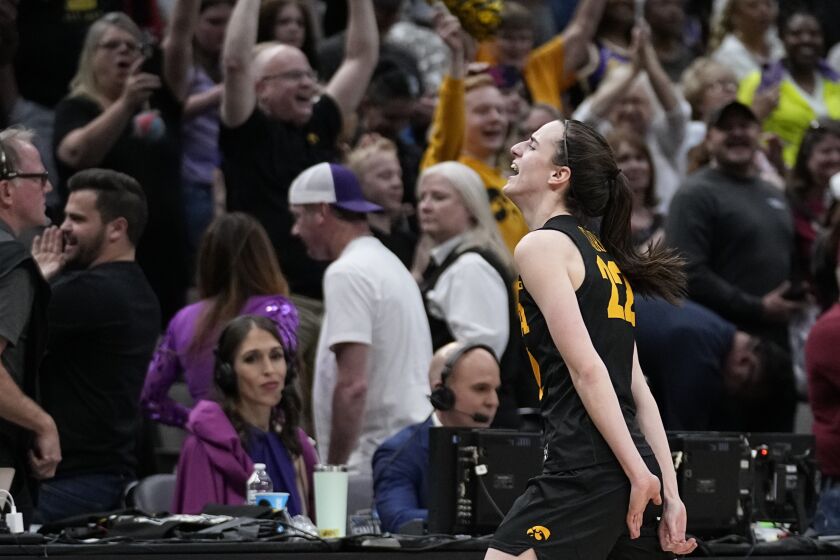 Iowa's Caitlin Clark reacts after the second half of an NCAA Women's Final Four semifinals basketball game against South CarolinaFriday, March 31, 2023, in Dallas. Iowa won 77-73 to advance to the championship on Sunday. (AP Photo/Tony Gutierrez)