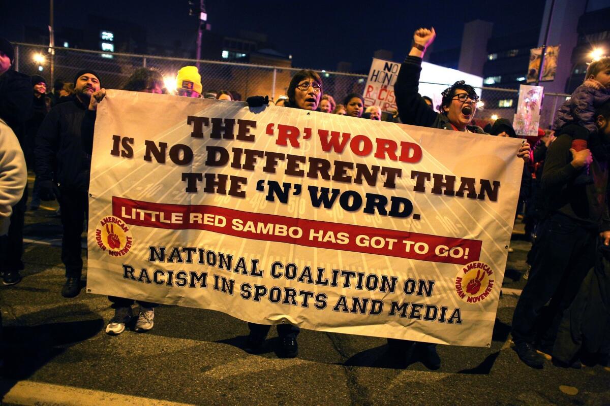 Native Americans protest before the Minnesota Vikings-Washington Redskins game in Minneapolis.