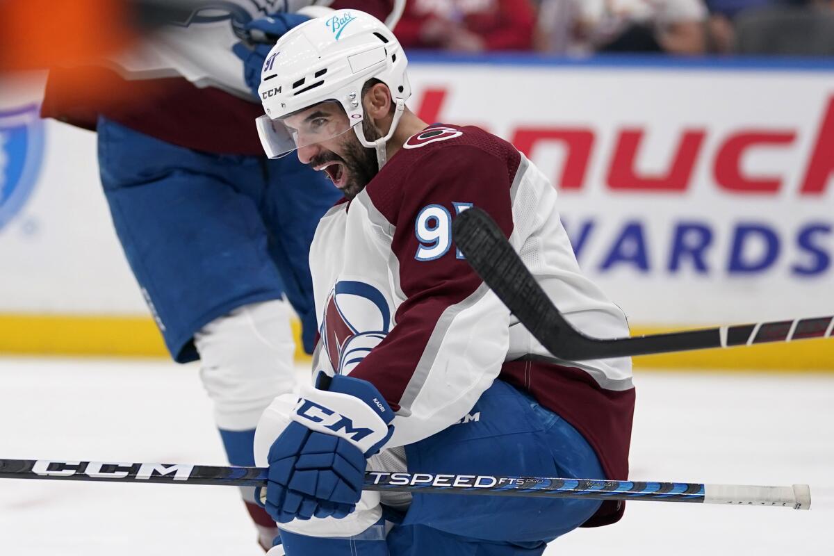 Colorado Avalanche's Nazem Kadri celebrates after scoring during the third period in Game 4 of an NHL hockey Stanley Cup second-round playoff series against the St. Louis Blues Monday, May 23, 2022, in St. Louis. (AP Photo/Jeff Roberson)