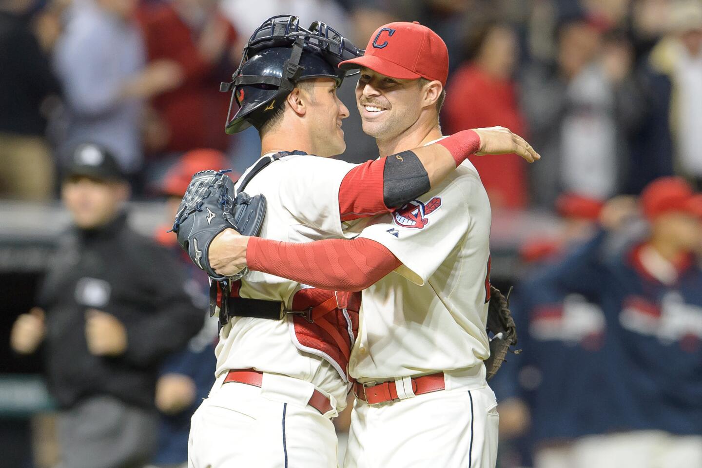 Yan Gomes celebrates with starting pitcher Corey Kluber after the Indians defeated the Sox.