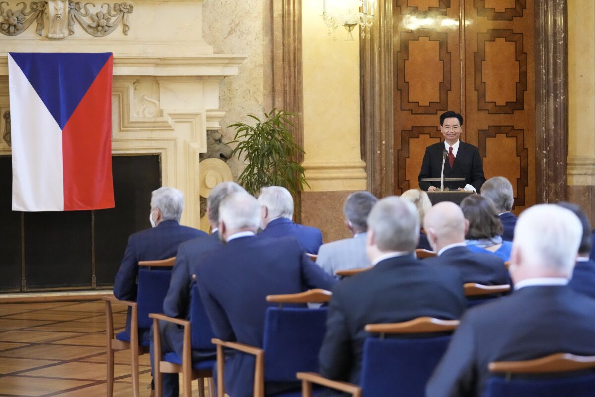 FILE - Taiwan Foreign Minister Joseph Wu holds a speech during his visit to Czech Senate in Prague, Czech Republic, on Oct. 27, 2021. Speaker of the Czech Parliament’s lower is set to visit Taiwan to boost mutual ties, a step that has angered China. Marketa Pekarova Adamova said Monday, March 20, 2023 she will be heading the largest such delegation from her country during the March 25 – 30 trip that focuses on business, trade, research, education, culture and other relations. (AP Photo/Petr David Josek, File)