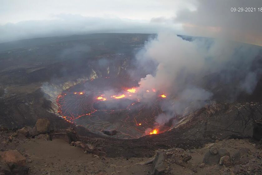 This webcam image provided by the United States Geological Survey shows a view of an eruption that has begun in the Halemaumau crater at the summit of Hawaii’s Kilauea volcano, Wednesday, Sept. 29, 2021. (USGS via AP)