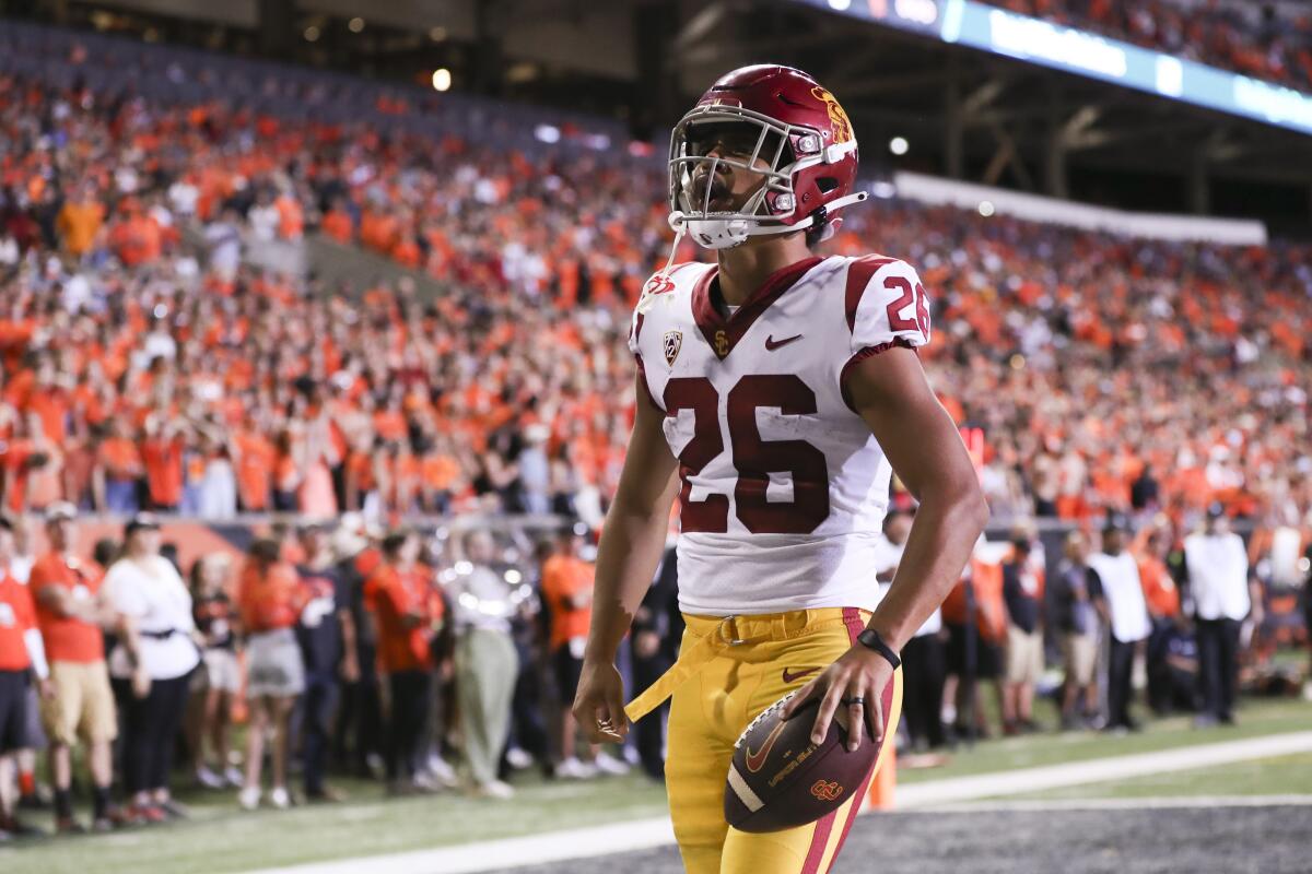 USC running back Travis Dye reacts after scoring a touchdown against Oregon State.