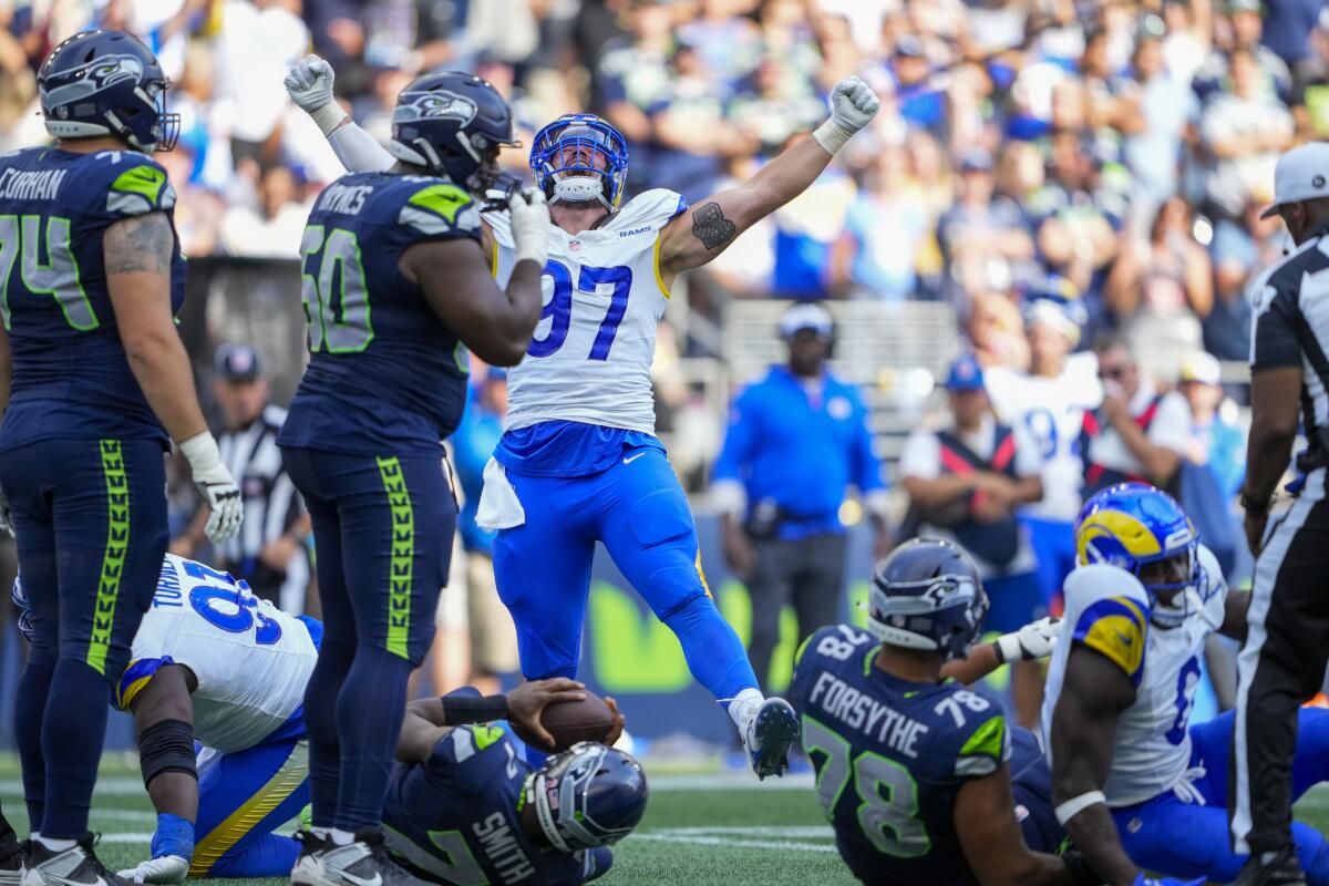 Rams linebacker Michael Hoecht celebrates after sacking Seattle Seahawks quarterback Geno Smith.