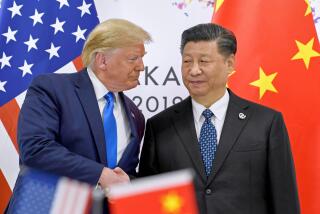 FILE - U.S. President Donald Trump, left, shakes hands with Chinese President Xi Jinping during a meeting on the sidelines of the G-20 summit in Osaka, western Japan, June 29, 2019. (AP Photo/Susan Walsh, File)