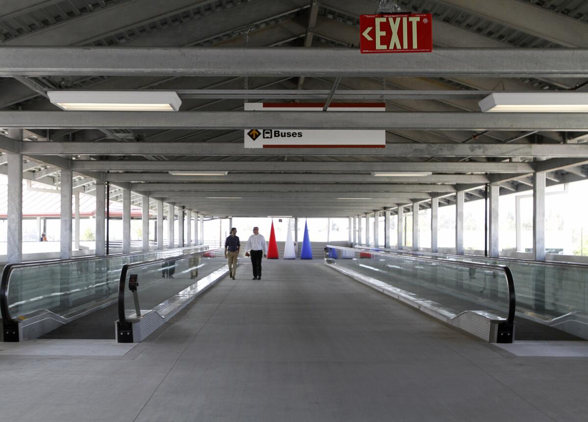 Some of the 'people movers' on the pedestrian bridge were ready to go during grand opening of the new Regional Intermodal Transportation Center at Bob Hope Airport in Burbank on Friday, June 27, 2014.