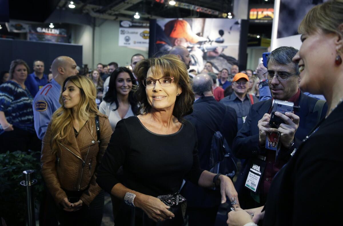 Earlier this week, former Alaska Gov. Sarah Palin promotes her television show, "Amazing America with Sarah Palin," at the Shooting, Hunting and Outdoor Trade Show in Las Vegas.