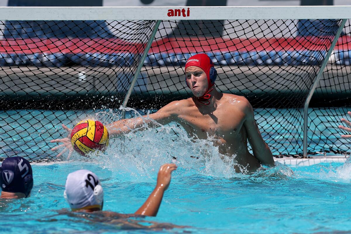 Vanguard Aquatics goalkeeper Jay Pyle makes a save against San Diego Shores in the 16U title match on Tuesday.
