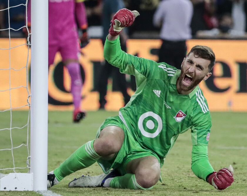 MLS goalie Matt Turner celebrates after turning away a penalty kick to help defeat Liga MX 