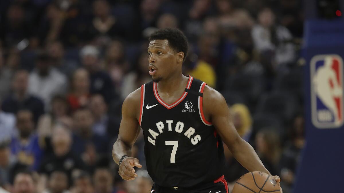 Toronto Raptors guard Kyle Lowry dribbles against the Golden State Warriors in San Francisco on March 5.