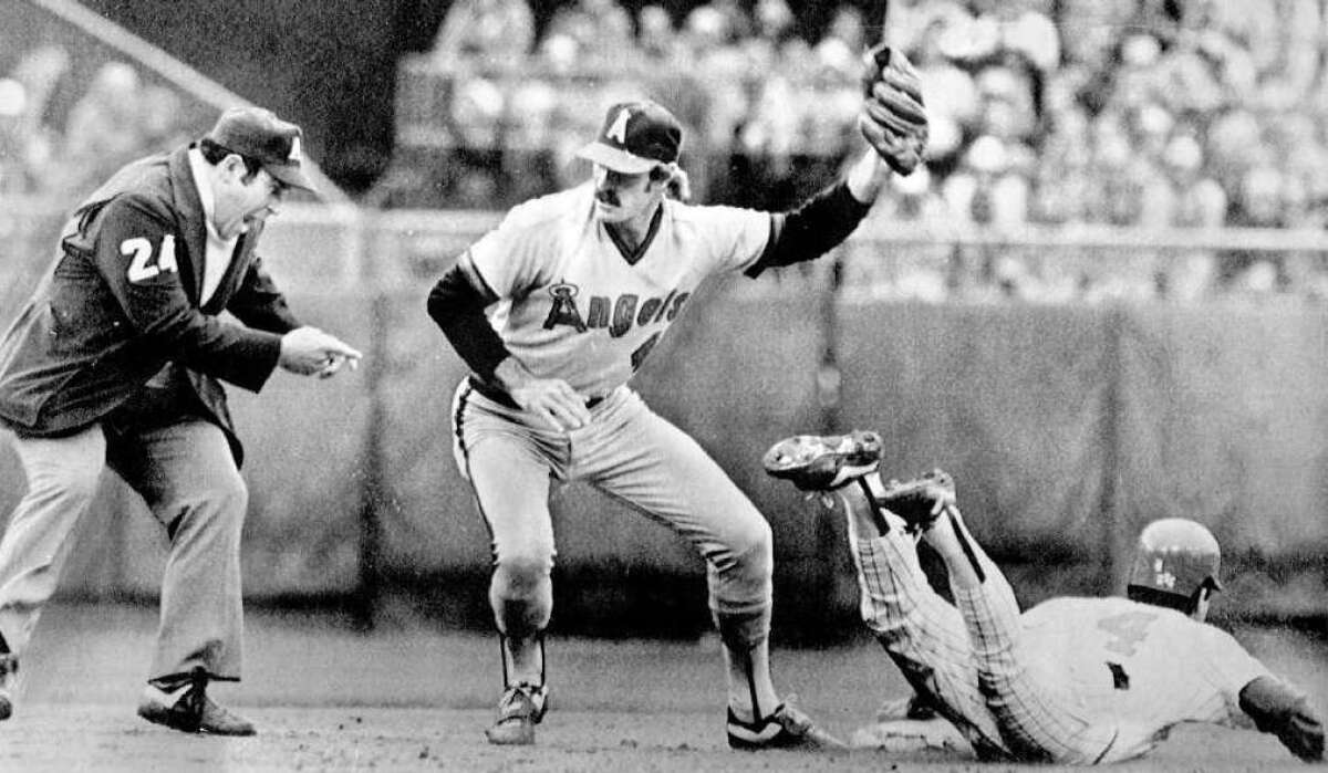 Bobby Grich tags Paul Molitor out trying to steal second base in 1982.
