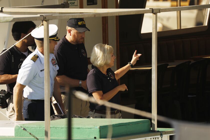 SANTA BARBARA, CA - SEPTEMBER 04, 2019 Jennifer Homendy, right, National Transportation Safety Board member with other NTSB and Coast Guard officials in Santa Barbara Harbor tour onboard Vision, the sister ship to Conception which burned at Santa Cruz Island killing 34 people. (Al Seib / Los Angeles Times)