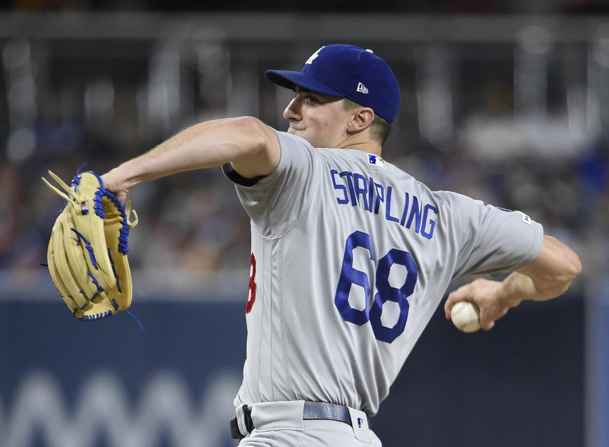 odgers starter Ross Stripling delivers during the first inning against the San Diego Padres.