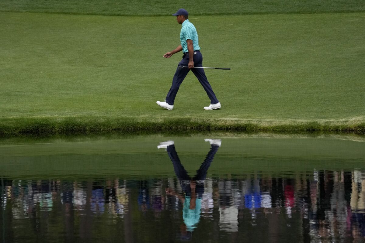 Tiger Woods walks along the 16th fairway during the second round of the Masters on Friday.