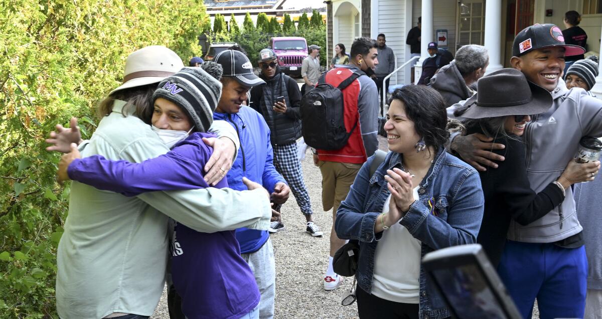 Migrants hug locals on Martha's Vineyard