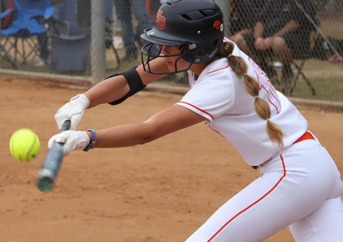 Huntington Beach's Maleah Humble (13) attempts a bunt against Chino Hills in a CIF Division 1 playoff game on Saturday.