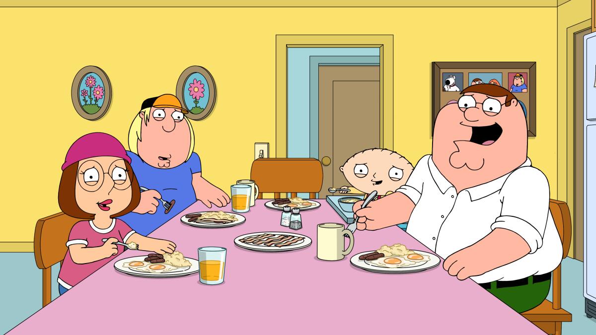Meg, Chris, Stewie and Peter Griffin eating breakfast in a scene from "Family Guy"