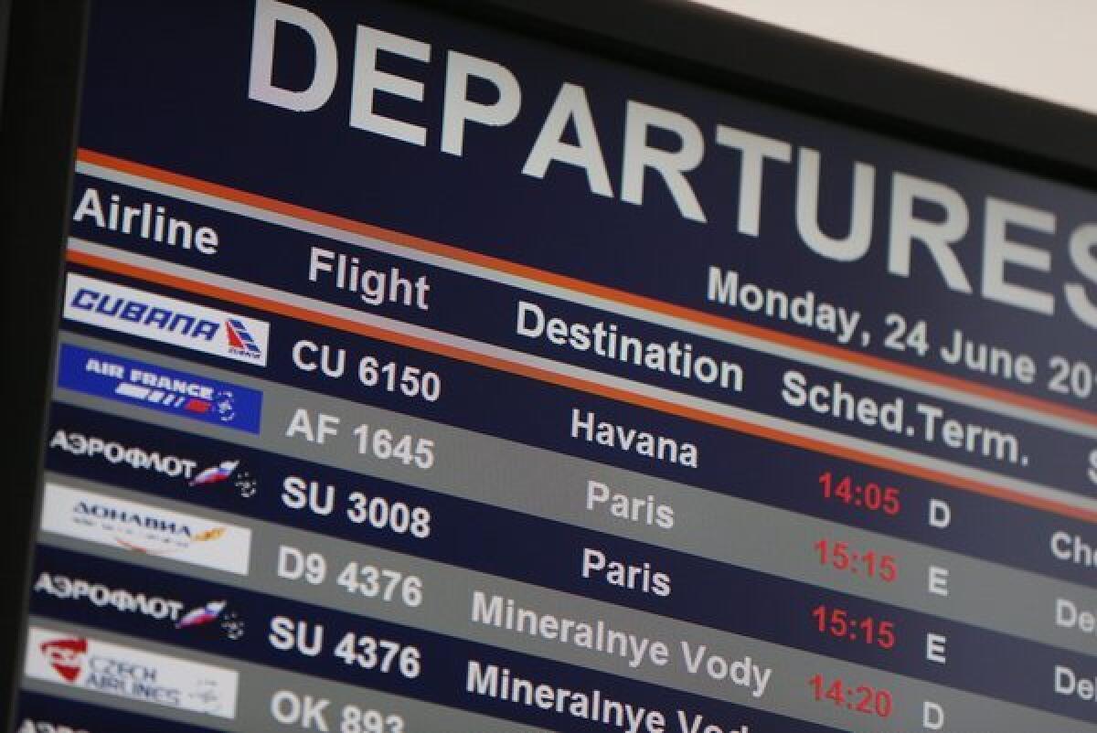 The board at Moscow's Sheremetyevo Airport indicates the departure of Cubana flight CU 6150 from Moscow to Havana. Edward Snowden had been expected to be aboard the flight, which is code-shared with Aeroflot.